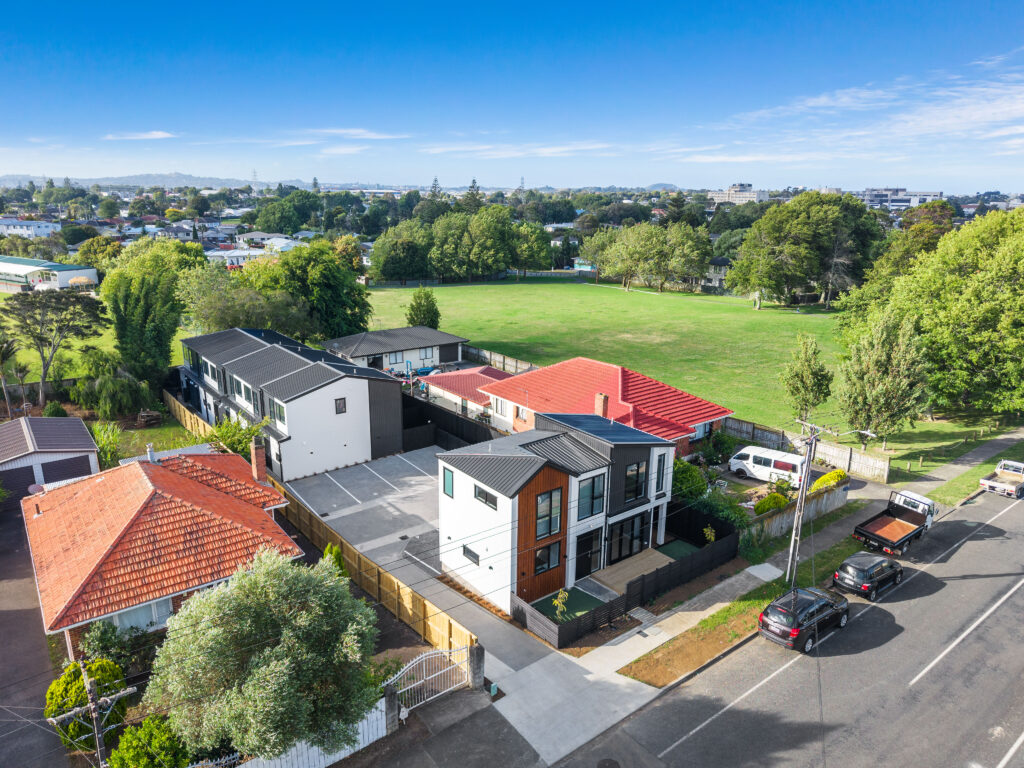 Aerial view of completed Oceana Homes development in Auckland